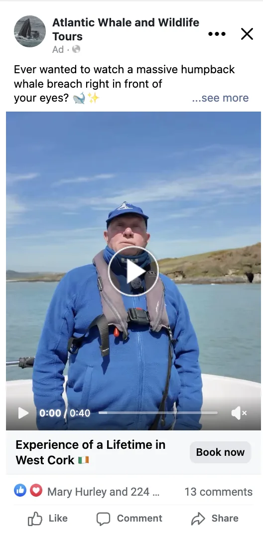 Facebook video ad from Atlantic Whale and Wildlife Tours showing a man in a blue jacket and life jacket speaking on board a boat